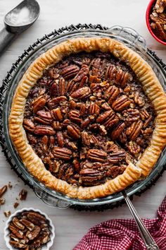 a pecan pie is sitting on a table