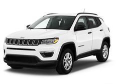 a white jeep parked in front of a white background