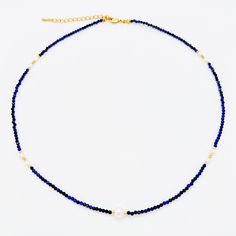 This stunning Necklace showcases the beauty of faceted Lapis Lazuli beads combined with delicate freshwater rice pearls, resulting in a truly unique and captivating design. The deep blue hue of the Lapis Lazuli beads exudes an air of timeless elegance and sophistication, perfectly complemented by the subtle charm of the freshwater rice pearls. MATERIALS: Metal: Gold Plated Brass Pearls: Natural Freshwater Pearls Stone: lapis lazuli DIMENSIONS Necklace Length: 17 inches(~43cm) + 2.5 inches extension PROCESSING & SHIPPING All of my pieces are shipped from the US, and I currently ship to customers in the US and Canada. I offer free shipping on all orders within the US. Shipping times will vary depending on your location, but I do my best to ensure that your order is shipped out as quickly as Blue Beaded Necklace With Pearl Drop For Gift, Blue Pearl Necklace With Natural Stones As A Gift, Blue Beaded Necklaces With Pearl Detail For Gifts, Blue Necklaces With Pearl Charm And Round Beads, Blue Pearl Necklace For A Gift, Blue Pearl Necklace With Charm For Jewelry Making, Blue Pearl Necklaces With Gemstone Beads, Blue Pearl Necklace For Gift, Blue Pearl Drop Necklace With Round Beads