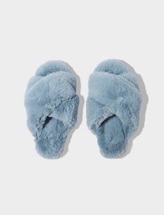 These super cute slides are the perfect addition to your sleepwear wardrobe all year round. Sink your feet into fluffy faux-fur slippers with cross-over straps. The sole is also lined in faux-fur, but reinforced with a resilient, non-slip outer – meaning you can wear these outside of the house! 100% Polyester Available in 3 easy sizes: Small - 5/6 Medium - 7/8 Large - 9/10 Cute Slippers Fluffy, Outside Of The House, Fluffy Shoes, Cute Slides, Blue Slippers, Round Sink, Fluffy Slippers, Cute Slippers, Silk Sleepwear