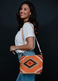 A new bag is always a good idea! This orange and multicolored Aztec inspired crossbody is the perfect option for your casual everyday outings this season. Versatile Orange Shoulder Bag With Removable Pouch, Orange Pouch Bag For On-the-go, Casual Orange Bag With Adjustable Strap, Versatile Orange Crossbody Bag, Orange Everyday Bag With Adjustable Strap, Orange Travel Bag With Adjustable Strap, Versatile Orange Shoulder Bag For Daily Use, Casual Orange Mobile Phone Bag, Trendy Orange Bags For On-the-go