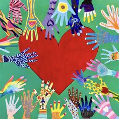 a heart surrounded by many different colored hands