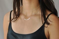 "Our chain choker is so versatile and looks stunning alone or layered with your favorites. Just the right amount of sparkle to get noticed!! Our gift to you 10% off your first purchase. Details here - http://eepurl.com/dpVPBz DETAILS 14 k gold fill or sterling silver Our model is wearing this necklace at approximately 16\" and 17\" but it looks gorgeous at shorter lengths too!! This listing is for one necklace only. See picture 1 for the style of necklace you will receive A 2\" extender chain al Chic Silver Chain Necklace For Wedding, Minimalist Layered Choker Necklace, Chic Silver Layered Necklace For Gift, Delicate Silver Layered Choker Necklace, Delicate Silver Choker Layered Necklace, Silver Layered Necklace With Delicate Chain For Weddings, Silver Delicate Chain Layered Necklace For Wedding, Wedding Silver Layered Necklace With Delicate Chain, Wedding Silver Delicate Chain Layered Necklace