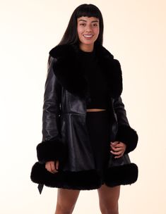 Wrap up in style in this faux fur trimmed belted coat from Blue Vanilla. Made in ChinaModel wears size 8 Long Black Coat, Belted Coat, Review Dresses, Dresses Uk, Fur Trim, Size 16, Long Coat, Black Coat, Faux Fur