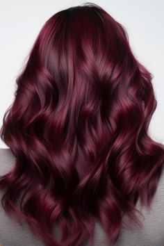 Create a burgundy plum balayage with layered locks in shades of plum and burgundy. This look works well for medium to long hair adding an element of surprise with each layer. Click here to check out more stunning burgundy balayage hair ideas trending right now. Deep Red Hair Color With Highlights, Vibrant Red Hair, Red Hair Color Ideas