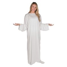 a woman in a white jesus costume standing with her arms out and hands out to the side