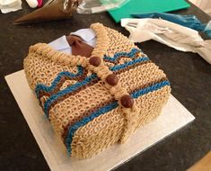 a knitted bag sitting on top of a counter