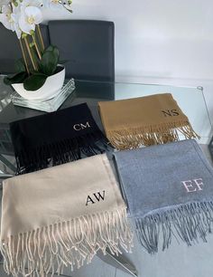 Our personalised scarfs are the perfect birthday gift, treating a loved one or even yourself!  Ideal for Christmas presents to use all year round. We can add initials or name to you scarf. Scarfs are personalised with high quality heat transfer vinyl that is permanently professionally heat pressed onto your Scarf.  Our personalisation is all hand made and unique to your order so please double check any personalisation names/ages/initials as we can't change these when your item has been made. Sho Winter Gift Silk Shawl Scarf, Rectangular Silk Scarf For Gift, Black Winter Scarf For Gift, Black Silk Scarf For Gift, Black Square Silk Scarf Gift, Rectangular Silk Scarf, Perfect For Gifts, Personalized Scarves, Secret Santa Gifts, Christmas Gifts For Her