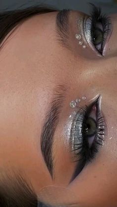 Makeup Beyonce Concert, Eye Looks With Rhinestones Hooded Eyes, Makeup For Beyonce Concert, White And Black Smokey Eye, Silver Jewel Makeup, Silver Glitter And Rhinestone Makeup, Makeup Looks Rine Stones, Crystal Eye Makeup Rhinestones, Beyonce Concert Makeup Looks