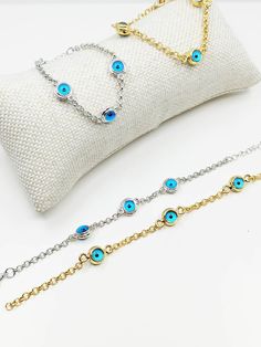 Blue Evil eye bracelet is adjustable so it comfortably fits on any wrist. Lenght of the nazar bracelet is 20.5 cm There are 3 evil eye beads on the Turkish eye jewelry. Evil Eye beads are double sided. Dainty evil eye bracelet would be the perfect gift for someone special. For more evil eye bracelets, click the link below; https://www.etsy.com/shop/EyeDesignsbyGG?ref=search_shop_redirect&section_id=30219689 Adjustable Blue Round Bead Chain Bracelet, Adjustable Blue Chain Bracelet With Round Beads, Adjustable Evil Eye Chain Bracelet Gift, Adjustable Round Chain Bracelet With Evil Eye, Adjustable Silver Chain Bracelet With Evil Eye, Blue Bracelets With Extender As Gift, Nazar Bracelet, Blue Evil Eye Bracelet, Jewelry Evil Eye