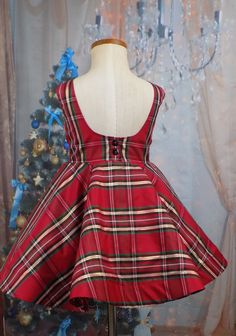 "Taffeta Party Dress in Red Green Black and Gold Plaid for Christmas. Adorable for viewing the Nutcracker Ballet or as Pageant Wear! Plaid Winter Dress is perfect for Christmas Dinner or any Holiday event. The Length used on this Sample is a Short Vintage Length Hand Made in the USA by Me! Custom Made to Measurements Provided Size 5T is pictured and Ready to Ship MATCHING \"BOYS VEST\" available Listing: https://www.etsy.com/listing/622934029/ ---------------------------------------------------- Fitted Sleeveless Dress For Dress-up Holiday, Festive Sleeveless Christmas Dress, Sleeveless Festive Christmas Dress, Red Sleeveless Holiday Dress, Sleeveless Holiday Dress For Festive Occasions, Fitted Sleeveless Holiday Dress, Red Sleeveless Christmas Holiday Dress, Festive Sleeveless Winter Dress, Fitted Sleeveless Christmas Holiday Dress