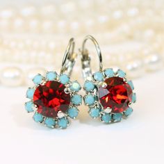 "Turquoise red Earrings, Aqua red Drop Crystal earrings Halo Earrings Red Blue European rhinestones Crystals Silver finish,Light Siam,SE96 A sparkly pair of drop earrings made with genuine 8mm (39SS) premium high quality crystals. Surrounded by small sparkling crystals. Will add just the right hint of color. Total diameter of the earring 7/16\" (11mm) Total Length: About 3/4\" inch (22mm) Check the additional photos to choose more colors. There are matching necklaces rings and bracelets to go wi Nickel Free Red Crystal Earrings For Parties, Red Jeweled Crystal Drop Earrings, Nickel-free Red Crystal Earrings, Red Nickel-free Crystal Earrings, Red Nickel-free Drop Crystal Earrings, Red Crystal Earrings For Gift, Red Crystal Round Earrings, Red Jeweled Dangle Earrings, Red Clip-on Round Jewelry