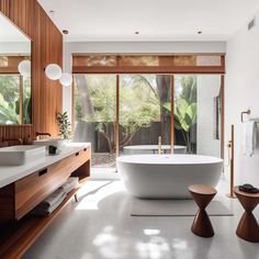 a modern bathroom with an oval bathtub