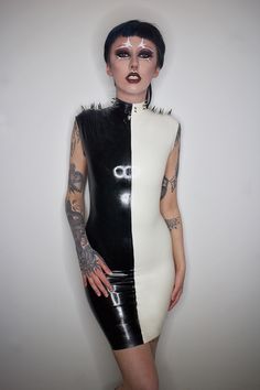 "Miserable, Darling, As Usual. Perfectly Wretched." Black and white latex mid length dress with high neck, cropped shoulders and spike detailing - Super comfortable, stretchy latex fit. - back zip for ease of putting on - Made to your sizing - Spikes customisable upon request - Length customisable upon request White Fitted Gothic Mini Dress, Gothic White Mini Dress For Parties, White Gothic Mini Dress For Party, White Sleeveless Gothic Dress, Latex Dress Halloween Costume, Edgy Sleeveless Dress For Costume Party, Dress With High Neck, Leather Outfits Women, Clothes Board