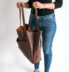 OVERSIZED LEATHER TOTE BAG - LEATHER SHOPPING BAG - LARGE TOTE This Leather Handbag is made of full grain, high quality natural leather. It's is very roomy - perfect for school, work and travel - great option as your everyday bag. Large interior provides a lot of space for all the daily essentials (books, cosmetic bag, accessories, laptop and other electronic devides, clothes and more). Inside the shopper bag there is an additional pocket with zipper for other small items. There is also large po Brown Hobo Bag With Pockets For Shopping, Brown Bucket Bag With Double Handle And Pockets, Brown Satchel With Pockets For Shopping, Brown Shopping Bag With Pockets, Brown Bags With Pockets For Everyday Use, Everyday Brown Bags With Pockets, Brown Hobo Bag With Pockets For Everyday Use, Everyday Brown Hobo Bag With Pockets, Brown Shoulder Bag With Flat Pocket For Travel