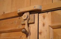 a close up of a wooden door handle