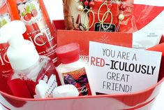 a red bucket filled with lots of different types of beauty products and personal care items