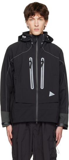 PERTEX SHIELD® nylon ripstop jacket. Reflective trim and contrast stitching throughout. · Water-repellent · Bungee-style drawstring at hood, hem, and back collar · Stand collar · Zip closure · Zip pockets · Reflective logo bonded at front · Zip vent at armscyes · Velcro tab at elasticized cuffs · Unlined Supplier color: Black Hooded Technical Nylon Track Jacket, Hooded Nylon Track Jacket In Technical Style, Technical Hooded Nylon Track Jacket, Technical Nylon Hooded Jacket, Technical Nylon Windbreaker With Detachable Hood, Technical Nylon Outerwear With Drawstring Hood, Technical Nylon Track Jacket With Reflective Details, Sporty Nylon Parka With Detachable Hood, Technical Nylon Windbreaker With Pockets