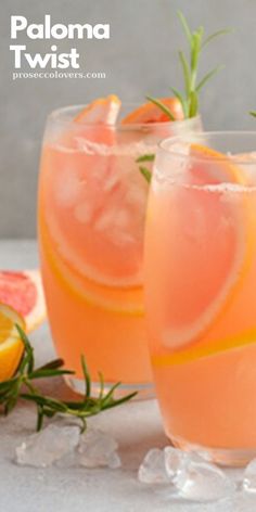 two glasses filled with watermelon lemonade and garnished with fresh rosemary