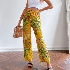 Yellow Wide Leg Pants With Green Leaves. Elastic Waist. Model Is 5'9 Size Xs (Fits Like A Small) These Are Too Large For Me, I'm A Size Xs. And I'm 5'2. Listing As A Small Since That's How They Fit. But They Are Labeled Xs. Brand New, Never Worn! High Waist Tropical Bottoms For Spring, Tropical Style Pants For Spring Day Out, Yellow Pants With Elastic Waistband, Yellow Straight Pants With Elastic Waistband, Yellow Summer Pants With Pockets, Yellow Vacation Pants With Pockets, Yellow High-waisted Pants For Spring, Yellow Bottoms With Pockets For Spring, Yellow Wide Leg Bottoms For Spring