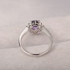 ◆ The ring is handcrafted from sterling silver and decorated with a dazzling 6*8 mm amethyst and cluster CZs. It is suitable for engagement/anniversary/daily occasion. ◆ Production Description: Main stone Type: Amethyst Main Stone Shape: Oval cut Main Stone Size: 6*8 mm(1.14ct) Side stone: CZ Metal: 925 Sterling silver - Other options available in the drop down menu ◆ Customization: √Add Engraving √Other Metal Type Available √Other Gemstones & Shapes Available √Personalization Requests Avail Elegant Cluster Amethyst Ring, Elegant Cluster Amethyst Ring For Anniversary, Elegant Amethyst Cluster Ring For Anniversary, Elegant Amethyst Cluster Ring, Elegant Purple Cluster Amethyst Ring, Silver Oval Amethyst Ring With Halo Setting, Oval Amethyst Ring In White Gold With Halo Setting, Oval Silver Amethyst Wedding Ring, Oval Sapphire Ring