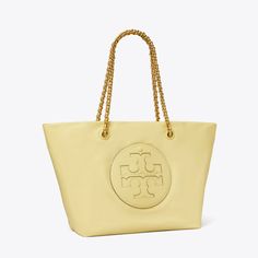 Instantly recognizable. The Ella Chain Tote is softly deconstructed in featherweight recycled nylon with a braided chain strap. Ideal for every day and getaways, it has a roomy interior for all the essentials, including a laptop. Tory Burch Ella, Lemon Sugar, Designer Tote Bags, Womens Designer Handbags, Designer Totes, Large Tote Bag, Leather Wraps, Tote Bag Design, Chain Strap