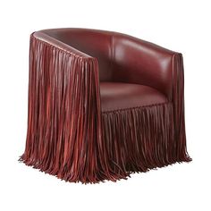 a red leather chair with fringes on it