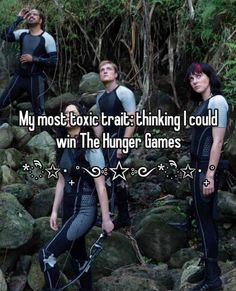 three people standing on rocks with the caption, my most - exotic thinking i could win the hunger games