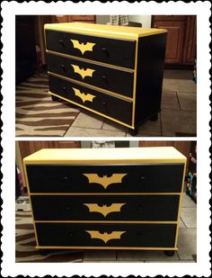 an old dresser has been painted black and gold with bats on the top, and bottom