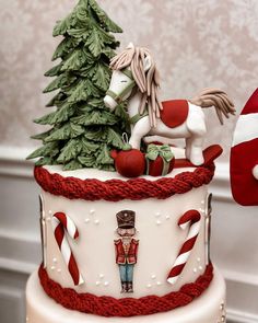 a cake decorated with an image of a horse and nutcracker