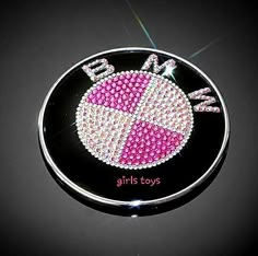 a pink and white beaded badge with the word bling bling on it