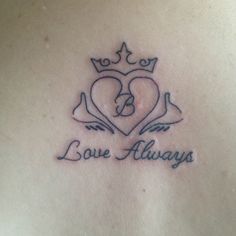 the back of a woman's chest with a tattoo that says love alwayss