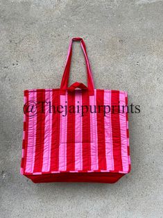 The Jaipur Prints  Red And Pink Stripe Quilted Cotton Tote Bag, Handmade Tote Bag, Indian Making Quilted Tote Bags, Cotton  Shoulder Bag, Women's Carry Bag The Indian Hand Block Printed Cotton Quilted Women's Handbags from Rajasthan India. This Handbag is completely Indian Printed on good quality cotton. Cotton quilted travel Bag made by Indian Artisans, this cotton quilted shopping bag is totally unique and multi purpose. Use this for your grocery or as a travel bag. Perfect to suit all. Item : Red Satchel Beach Bag For Daily Use, Red Satchel Canvas Bag For Shopping, Red Double Handle Box Bag For Errands, Red Canvas Satchel For Shopping, Red Box Bag For Daily Use, Red Box Bag For Errands, Red Box Bag With Large Capacity For Daily Use, Handmade Red Beach Bag For Everyday, Red Pouch Box Bag For Daily Use