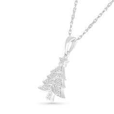 A Christmas classic, this diamond tree pendant brings the spirit of the season to your look. Fashioned in sterling silver, this choice showcases a layered tree design shimmering with diamonds and beaded details. Radiant with 1/20 ct. t.w. of diamonds and a bright polished shine, this pendant suspends along an 18.0-inch rope chain that secures with a spring-ring clasp. Christmas Silver Cubic Zirconia Necklace, Silver Cubic Zirconia Necklaces For Christmas, Elegant Christmas Diamond Jewelry, Elegant Sterling Silver Jewelry For Holidays, Elegant Silver Jewelry For New Year, Sparkling Silver Christmas Jewelry, Elegant White Gold Jewelry For Christmas, Diamond Christmas, Christmas Classic