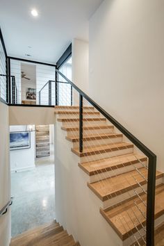 the stairs are made of wood and metal