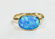 14k yellow gold ring with oval opal stone The opal stones are setting in 14k gold bezel. It is impressive, powerful and very beautiful ring. This ring can be made to order in any size. Please note your desired size in the message to seller area at checkout. size stone is 10 mmX 14mm width ring: 4 mm It will take to me 1 week to make your order and send her to you... Come in a gold gift box. Fallow me on facebook for newest updates. http://www.facebook.com/pages/Orit-Naar-jewelry/174677569247132? Classic Oval Opal Ring With Bezel Setting, Classic Oval Bezel Set Opal Ring, Oval Opal Rings With Bezel Setting, Oval Opal Ring In Yellow Gold Stamped 14k, Oval Opal Rings With Polished Finish, Yellow Gold Oval Opal Ring, Oval 14k Gold Opal Ring, Oval Opal Ring In 14k Gold, Hallmarked, Hallmarked 14k Gold Opal Ring, Oval Shape