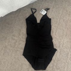 Urban Outfitters Black Bodysuit W/ Mesh In The Front And A Deep V Back (Xs) Party Bodysuit With Built-in Bra And V-neck, One-piece Bodysuit With Built-in Bra For Night Out, Black V-neck Swimwear For Evening, V-neck Shapewear Bodysuit For Night Out, Black V-neck Bodysuit With Built-in Bra, Party Bodysuit With Built-in Bra, Party One-piece Bodysuit With Built-in Bra, V-neck Bodysuit With Built-in Bra For Party, Party V-neck Bodysuit With Built-in Bra