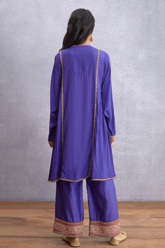 Amethsyt purple kurta highlighted with embroidery, embellishments, notched neckline and full sleeves. Comes with pant.
Components:2
Embroidered
Neckline:Notched
Sleeve Length:Full
Fabric:Kurta: Original Silk Crepe, Pure Cotton Silk; Pant: Handwoven Chanderi, Pure Cotton Silk, Cotton Voile
Color:Purple
Straight kurta
Embroidered pant - Aza Fashions Embroidery Embellishments, Silk Pant, Notched Neckline, Embroidered Pants, Straight Kurta, Embroidered Neckline, Kurta With Pants, Cotton Voile, Full Sleeves