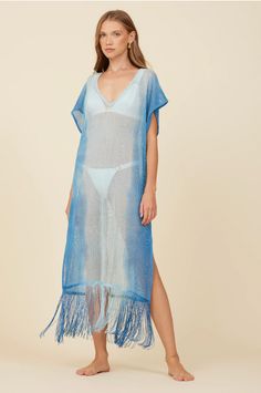 Your new favorite coverup for your next vacay, the new Metallic Mesh Knit Cover Up in Blue! Perfect for summer days, this coverup will have you looking stylish and feeling comfortable. Say goodbye to boring coverups and hello to fun in the sun with this metallic beauty featuring tassels at the bottom! Blue Beach Dress For Resort Season, Blue Beachy Dress For Resort Season, Beachy Blue Beach Dress For Resort Season, Blue Cover-up For Vacation In Spring, Blue Beach Dress For Resort Season Beach Party, Blue Beach Dress For Resort Season And Beach Party, Blue Cover-up For Spring Vacation, Blue Summer Cover-up, Blue Beach Dress For Resort Season Poolside