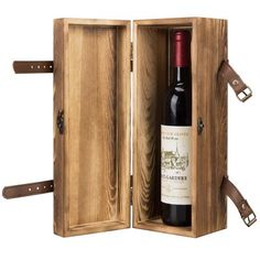 a bottle of wine in a wooden box with leather strap around the bottom and inside