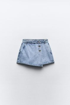 Z1975 WRAP DENIM SKORT - Light blue | ZARA United States Denim Skort With Belt Loops In Short Length, Denim Skort With Belt Loops, Denim Skort With Belt Loops Short Length, Zara Mini Skort With Pockets, Chic Denim Skort With Pockets, High Waist Denim Skort With Button Closure, Trendy Zara Mini Skirt With Pockets, Summer Denim Skort With Belt Loops, High Waist Denim Skort With Belt Loops