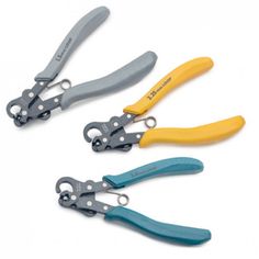 three pairs of scissors are shown in four different colors and sizes, one is yellow, the other is blue