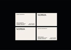 four square business cards with the words norma on them in black and white, against a dark background