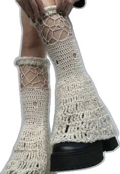 a woman's legs wearing white crocheted socks