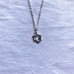 Silver circle dolphin pendent and chain.Available in 18", 20" and 24" chains.Any questions don't hesitate to drop me a message. Trendy Silver Hypoallergenic Charm Necklace, Grunge Style Sterling Silver Jewelry Gift, Silver Grunge Necklace As A Gift, Silver Grunge Necklace For Gifts, Silver Grunge Necklace For Gift, Silver Stainless Steel Grunge Jewelry, Silver Grunge Stainless Steel Jewelry, Necklace Pendent, Rock Tattoo