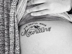 a woman has a tattoo on her stomach that says, i'd youll move mountains