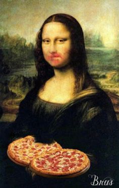 a woman holding two pizzas in front of her face