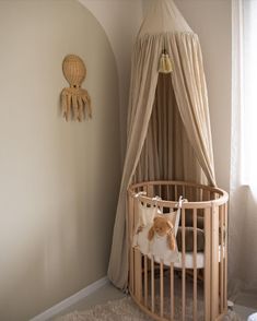 a baby crib in the corner of a room