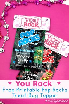 the free printable pop rocks treat bag topper is displayed on a pink background