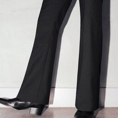 Timeless Fitted Wide-leg Dress Pants, Luxury Wide Leg Dress Pants For Work, Elegant Wide Leg Pants For Business, Elegant Wide Leg Pants With Pressed Crease For Business, Luxury Tailored Wide Leg Pants For Office, Luxury Tailored Wide Leg Pants For Workwear, Timeless Fitted Wide Leg Pants For Formal Occasions, Luxury Wide Leg Pants With Belt Loops For Work, Elegant Wool Wide Leg Ankle-length Pants